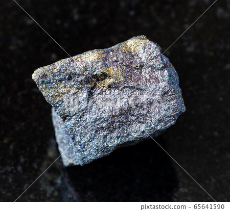 raw Bornite with Chalcopyrite rock on black 65641590