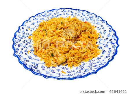 portion of Chicken biryani on plate isolated 65641621