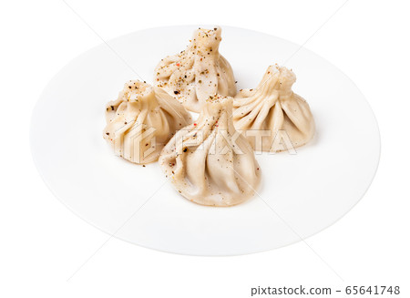 portion of peppered khinkali on plate isolated portion of peppered khinkali on plate isolated 65641748
