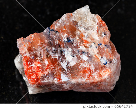 rough red Rock Salt (Halite) on black rough red Rock Salt (Halite) on black 65641754