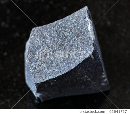 rough Hyalobasalt rock on black rough Hyalobasalt rock on black 65641757