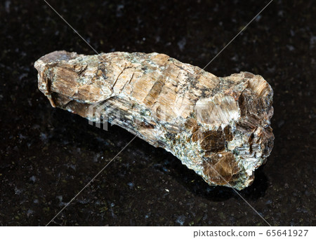 rough Bronzite (Enstatite) rock on black 65641927