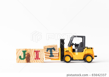 Toy forklift hold wood letter block T to complete word JIT (Abbreviation of Just in time) on white background Toy forklift hold wood letter block T to complete word JIT (Abbreviation of Just in time) on white background 65642337