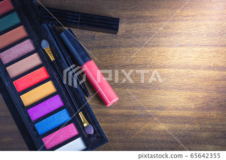 Flat lay (top view) set of make up cosmetics on Flat lay (top view) set of make up cosmetics on 65642355
