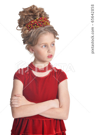 Portrait of cute girl in red dress posing isolated on white background Portrait of cute girl in red dress posing isolated on white background 65642858