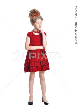 Portrait of girl in red dress posing isolated on white background Portrait of girl in red dress posing isolated on white background 65642870