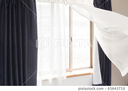 Curtains fluttering in the wind 65643718