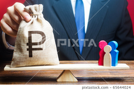 Man puts russian ruble money bag on scales with a family. Help aid migrants. Social assistance, financial support for who in need, vulnerable populations. Donations, invest in human capital. 65644024