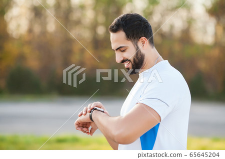 Fitness. Young man running in urban environment Fitness. Young man running in urban environment 65645204