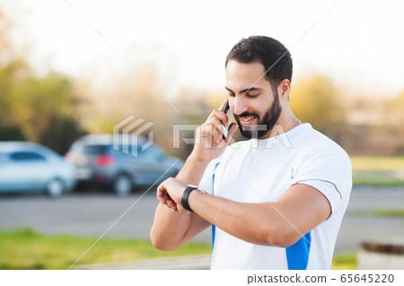 Fitness. Young man running in urban environment Fitness. Young man running in urban environment 65645220