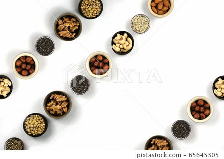 Nuts in round cup, top view close up. Nuts in round cup, top view close up. 65645305