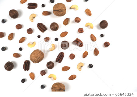 A pattern of nuts on a white background. 65645324