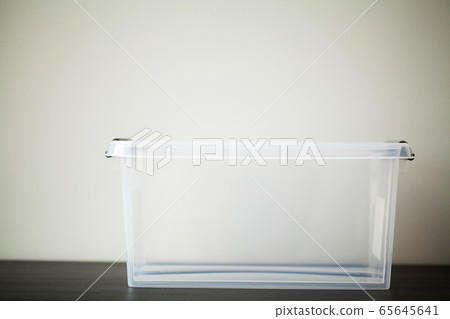 Transparent drawers for storing things on a wooden table Transparent drawers for storing things on a wooden table 65645641