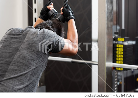 Men training in the gym 65647162