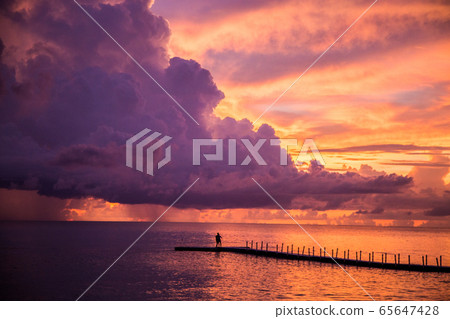 Khao Lak beach resort views at sunset, in Thailand 65647428