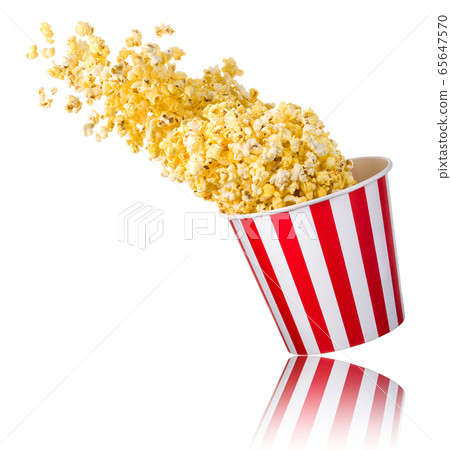 Flying popcorn from paper striped bucket isolated Flying popcorn from paper striped bucket isolated 65647570
