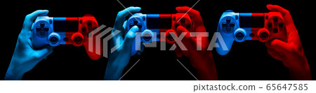 Set of hands holding video game gamepad in neon Set of hands holding video game gamepad in neon 65647585