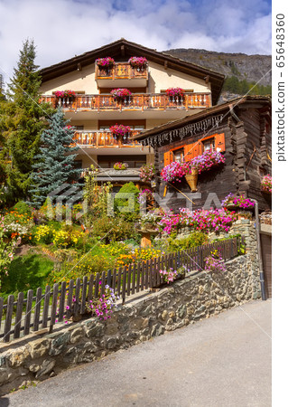Houses in Zermatt alpine village, Switzerland 65648360
