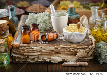 Bottles of homeopathic drugs, ingredients 65649763