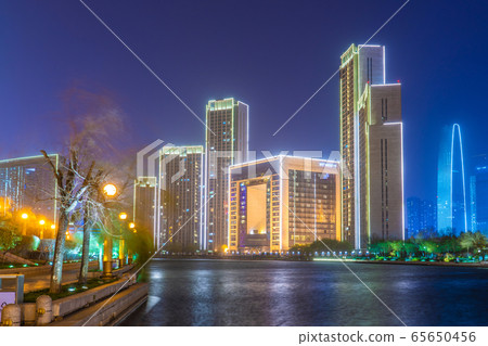 Night view of modern city buildings Night view of modern city buildings 65650456
