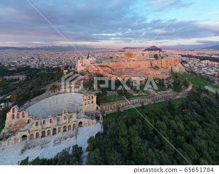 Aerial view of Acropolis of Athens, the Temple of Athena Nike, Parthenon, Hekatompedon Temple, Sanctuary of Zeus Polieus, Odeon of Herodes Atticus, Erechtheion at sunset 65651784