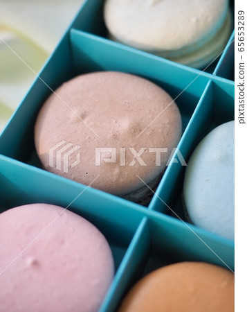 Colorful macarons in various colors, gift box Colorful macarons in various colors, gift box 65653289