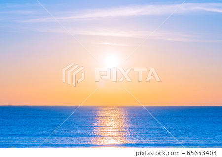 Beautiful tropical nature beach sea ocean at sunset or sunrise Beautiful tropical nature beach sea ocean at sunset or sunrise 65653403