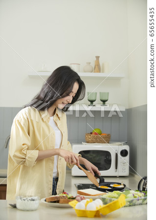 Woman, cooking, food Woman, cooking, food 65655435