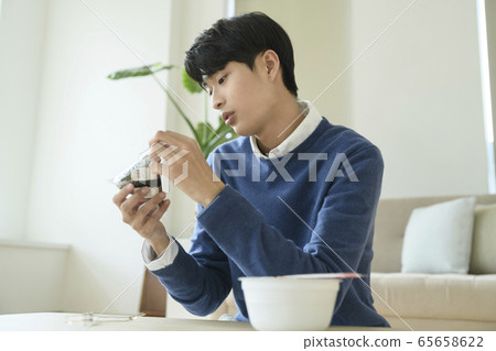 Single life concept, young cheerful Asian man's daily life 277 65658622