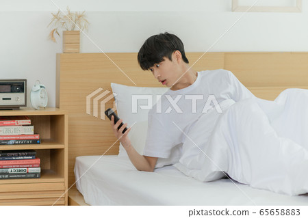 Single life concept, young cheerful Asian man's daily life 042 65658883