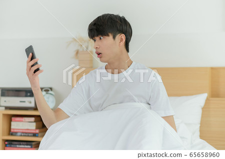 Single life concept, young cheerful Asian man's daily life 045 65658960