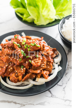 fried pork with spicy korean sauce (bulgogi) 65660731