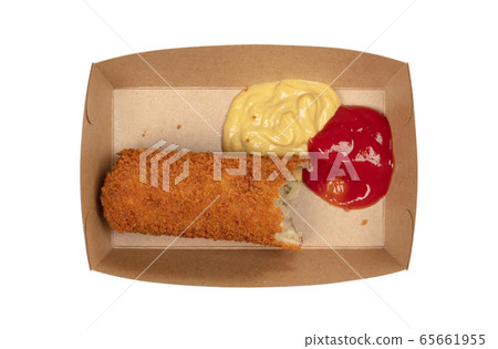 Partly eaten brown crusty dutch kroket with 65661955
