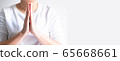 A close-up of Asian person's hands paying respect; for saying hi, thanking, apologizing and farewell 65668661