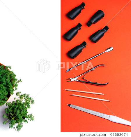 Top view of equipment for manicure and pedicure on a orange background. Top view of equipment for manicure and pedicure on a orange background. 65668674