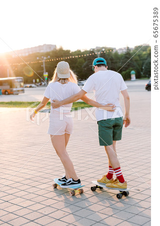 in one sunny day fashionable couple of hipster 65675389