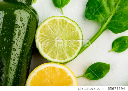 Slices of fresh citrus fruit and vegetables Slices of fresh citrus fruit and vegetables 65675394
