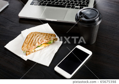 Business lunch concept during the work process. 65675398