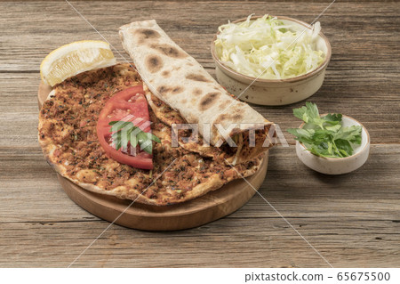 Turkish pizza, made of ground beef and onion 65675500