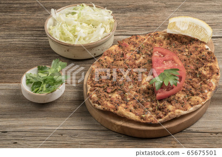 Turkish pizza, made of ground beef and onion 65675501