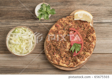 Turkish pizza, made of ground beef and onion 65675503