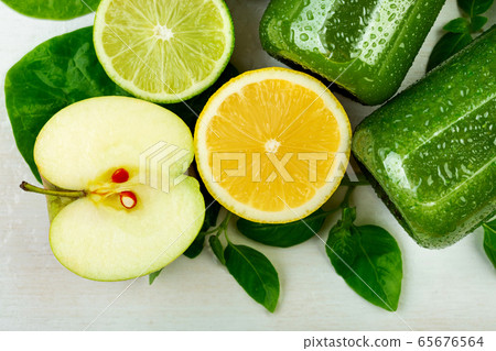 Cut into slices of fruits and citrus apple lime Cut into slices of fruits and citrus apple lime 65676564