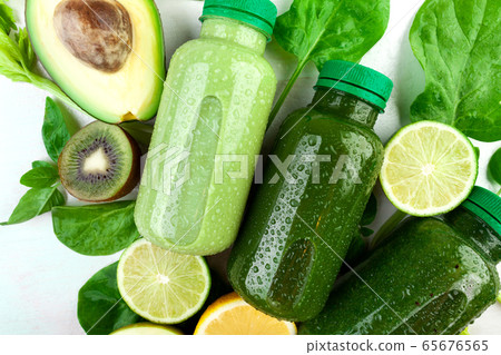 A creative composition of several bottles of green A creative composition of several bottles of green 65676565