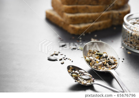 Healthy bread slices on dark background with mix 65676796