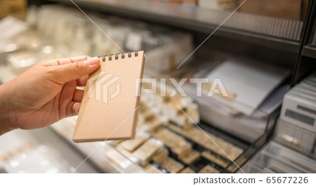 Blank brown paper sheet of notebook stationery without line for writing text memo. 65677226