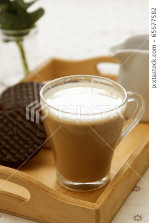 Latte coffee, glass cup of coffee and milk with 65677582