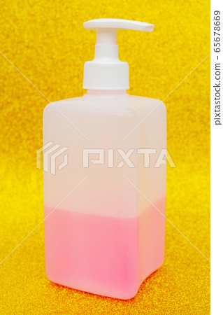 Antibacterial disinfectant soap. Liquid pink soap in white bottle. Antibacterial disinfectant soap. Liquid pink soap in white bottle. 65678669