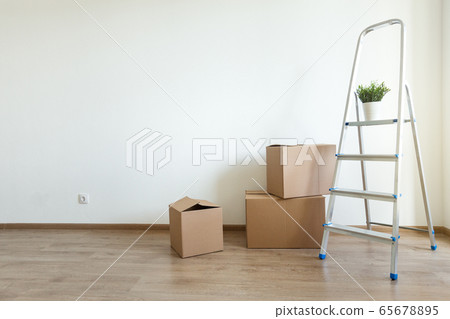 Different cardboard boxes for moving and ladder at Different cardboard boxes for moving and ladder at 65678895