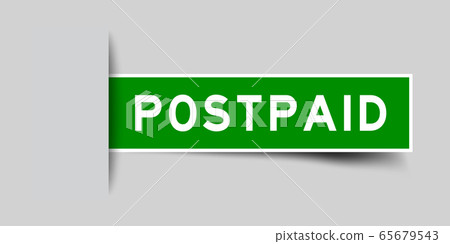 Inserted green color sticker label with word postpaid on gray background Inserted green color sticker label with word postpaid on gray background 65679543