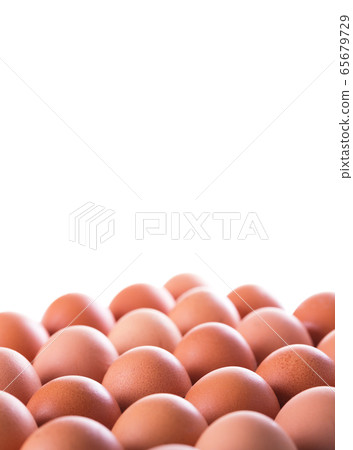 Pile of Fresh eggs, closeup on white background 65679729